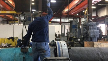 Ship Repair Reaming Coupling Bolt Holes by hand Ship Repair Reaming Coupling Bolt Holes by hand